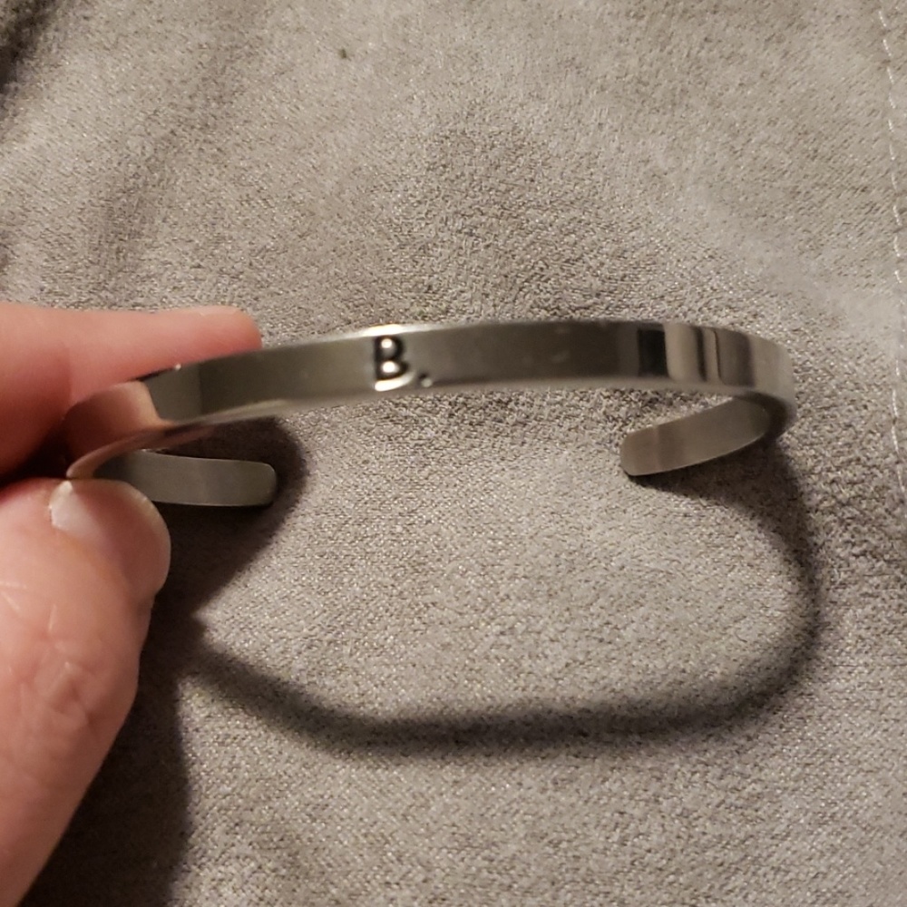 B. silver bangle